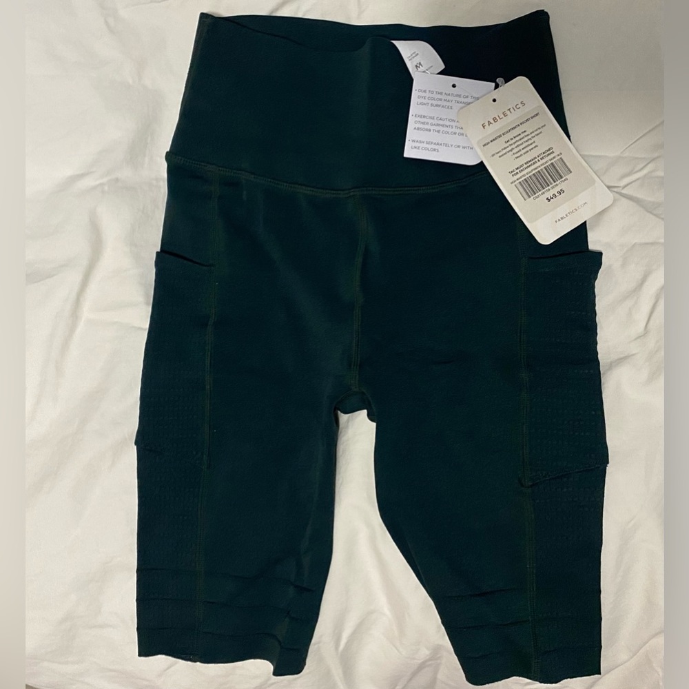Fabletics women’s high waisted sculpt kit shorts, dark green size 8